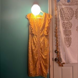 Yellow lace dress .